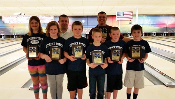 Several children were awarded $50 scholarships for their team’s finish at Strike Force Bowling’s 2014-15 club championships. Winners included Adam Henze of Montgomery, Brandon Sleva of New Prague, Cassidy Williams of New Ulm, Cassie Nielsen of Albert Lea, Hunter Pomije of New Prague and Joshua Wenninger of Lafayette. The bowlers are coached by Brian Henze and Darin Pomije. — Provided