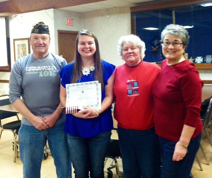 Voice of Democracy winner Megan Lindely received $100 and an award from Freemond Madsen VFW Post 447. With Lindely is VFW Cmdr. Jim Hockinson, Auxiliary President Fran Camerer and Youth Activities Chairman Marilyn Danielsen. — Provided