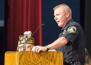 J.D. Carlson, deputy director of police with the Albert Lea Police Department, addresses the audience during the Memorial Day ceremony at Albert Lea High School. - Sarah Stultz