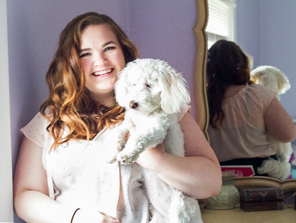 Kessa Albright, 20, pictured with her dog Maggie, was diagnosed with depression when she was 16. See a video online of people from the series at albertleatribune.com. - Colleen Harrison/Albert Lea Tribune