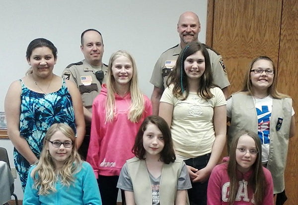 Freeborn County Sheriff’s Office Sgt. Keith Bolinger and Sheriff Kurt Freitag spoke with Girl Scout Troop 44836 about emergency preparedness and first aid. - Provided