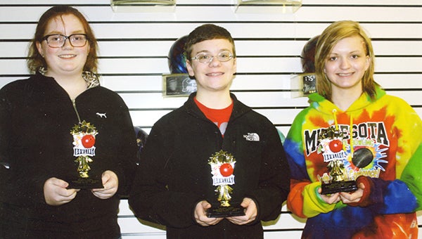 Third-place finishers of the McDonald’s Friday Nite Youth League at Holiday Lanes from left are Angela Riekens, Landon Kirchner and Rachel Reichl. — Provided