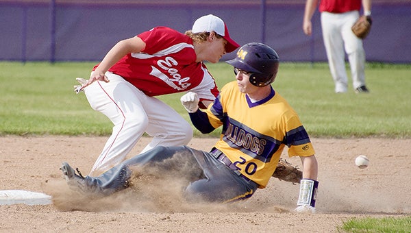 Charlie Dugger of Lake Mills slides into second base Wednesday against West Hancock. Dugger was 1-for-3 with one run scored, an RBI, three stolen bases and a walk. Lory Groe/For the Albert Lea Tribune — Lory Groe/For the Albert Lea Tribune