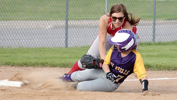 Cassidy Cox of Lake Mills slides into third base Wednesday during the Bulldogs’ 10-6 home win over West Hancock. Lake Mills is 1-3 overall. Cox had two hits. — Lory Groe/For the Albert Lea Tribune