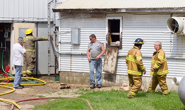 Firefighters from multiple departments respond to a small electrical fire in a hog barn Thursday afternoon at 67538 170th St., southeast of Conger. Authorities stated there was minimal damage, and there were no hogs inside the barn at the time of the fire. - Sarah Stultz/Albert Lea Tribune