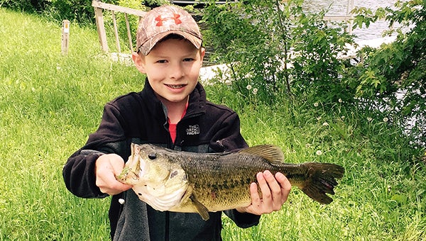 Thomas Lundell, 12, caught and released an estimated 3 1/2-pound bass last Sunday in his backyard on Fountain Lake in Albert Lea. Send your fish photos for a chance to be the Catch of the Week to tribsports@albertleatribune.com. Information should include the name and address of the angler, as well as the species, length, weight of the fish, the body of water where it was caught and the bait used. — Provided