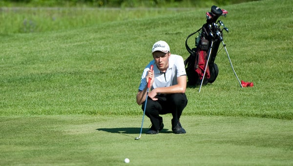 Ryan Pederson of United South Central surveys the green on the first hole Tuesday at the Class A state golf meet at Pebble Creek Golf Club in Becker. — Micah Bader/Albert Lea Tribune