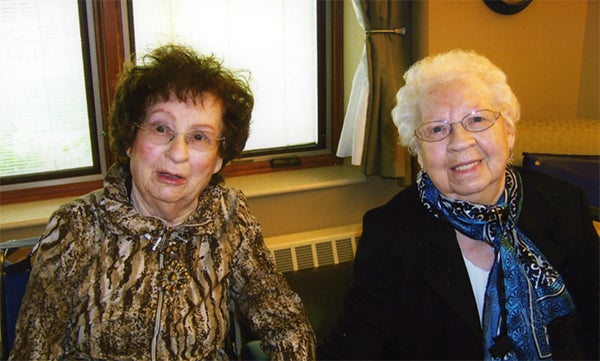 Sisters Burnette Holstad Sanderson and Mildred Holstad Patterson graduated 80 years ago with the Northwood High School class of 1935. The sisters graduated during the same year because Sanderson took a year off of school to help her father farm in North Dakota. — Provided