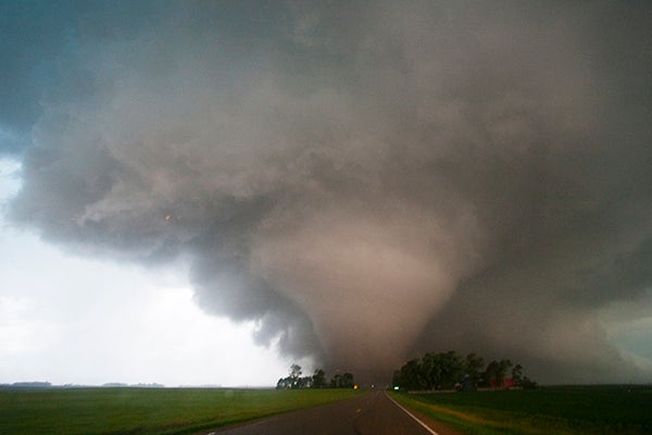 A tornado moves across the rural Conger countryside on June 17, 2010. This image was shot from Freeborn County Road 17 generally west of this tornado, which was increasing to EF4 strength at this point. In this image it was directly over the farm of Jeff and Beth Zeller. - - Photo courtesy Benjamin and Michael Tillotson/TCS.net