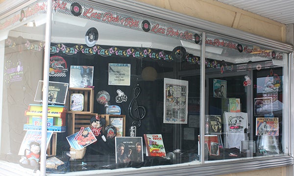 Expressions Salon and Spa took second place for the Eddie Cochran window display contest. They hung old records with paper and streamers in the window. - Madeline Funk
