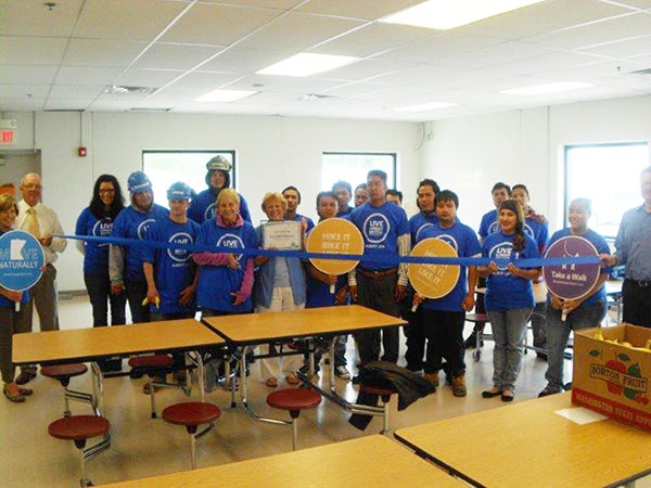Albert Lea Select Foods, a Blue Zones worksite, celebrated its designation in their cafeteria on June 15. The company has more than 280 employees involved in the Blue Zones project, many of which wore their Blue Zones project T-shirts to the event. - Provided 