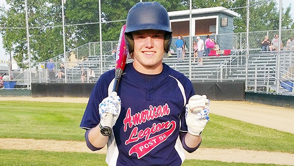 Albert Lea Legion Post 56’s Parker Mullenbach holds the ball he hit for a grand slam Friday against St. Paul Park at Mankato East. Mullenbach’s hit erased an early 3-0 Albert Lea deficit. — Provided