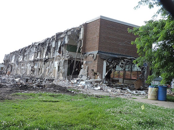 As of Friday, the center section of the USC school had been demolished while sections of the high school and a section of the elementary school remain standing. - Kelly Wassenberg/Albert Lea Tribune