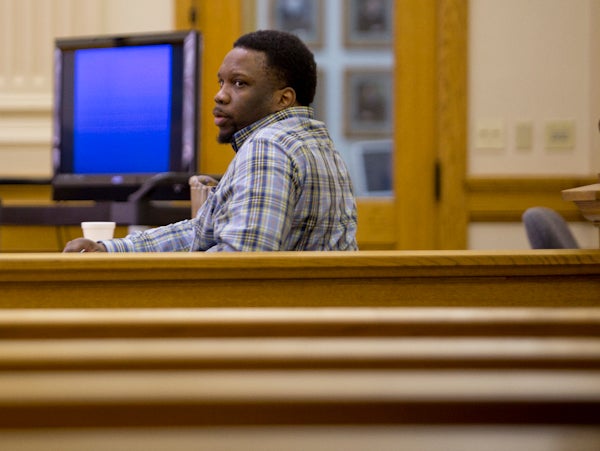 Rows of seats sit empty behind Tyrone Washington Jr. during closing arguments in his trial Monday in Fort Dodge, Iowa. On Tuesday, Washington was convicted of first-degree murder in the 2013 stabbing death of ex-girlfriend Justina Smith in Northwood. - Colleen Harrison/Albert Lea Tribune