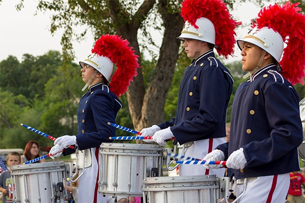 Members of Albert Lea High School's marching band play during the Third of July Parade as they come down Bridge Avenue on Friday. — Sarah Stultz/Albert Lea Tribune