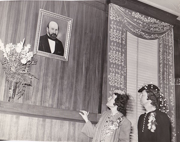 Albert Miller Lea's granddaughters Lila Lea and Jessie Roberts look at Lea's portrait during a visit to Colonel Days in 1941. - Photo courtesy Freeborn County Historical Museum