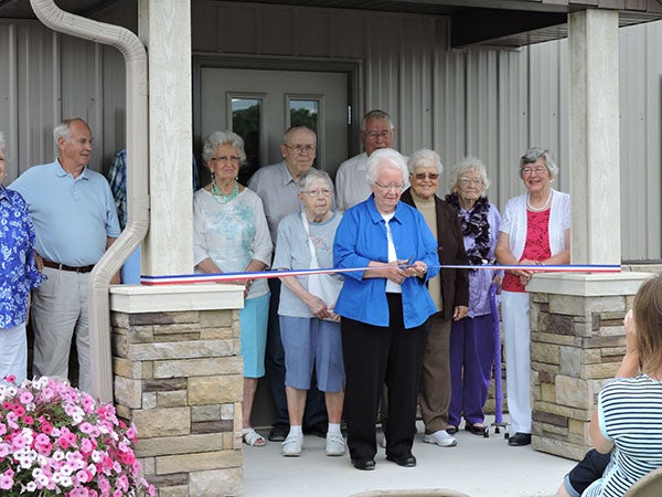 Kathy Jensen, who helped conceive the idea of a historical museum in Clarks Grove, was given the honor of cutting the ribbon during the museum’s open house on Saturday. She is surrounded by other members of the Clarks Grove Heritage Society that helped the museum come to fruition. The museum will be open from 8:30 to 11:30 a.m. on Saturdays and by appointment by calling Jensen at 507-256-8011 or 507-391-4334; Everett Jensen at 507-256-4120 or 507-383-1158; or Clarks Grove Historical Society President Marvel Beiser at 507-373-7442 or 507-320-0835. - Kelly Wassenberg/Albert Lea Tribune