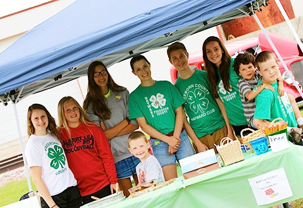 The Hayward 4-H Club served root beer floats and homemade bars and had a bean bag toss at Hayward Days on July 11. Workers included Emma Iverson, Bethany Tennis, Sarah De Haan, Kristen Haan, Noah Iverson, Alexis Tasker, Adam Semple and Summer Kath who is not pictured. - Provided