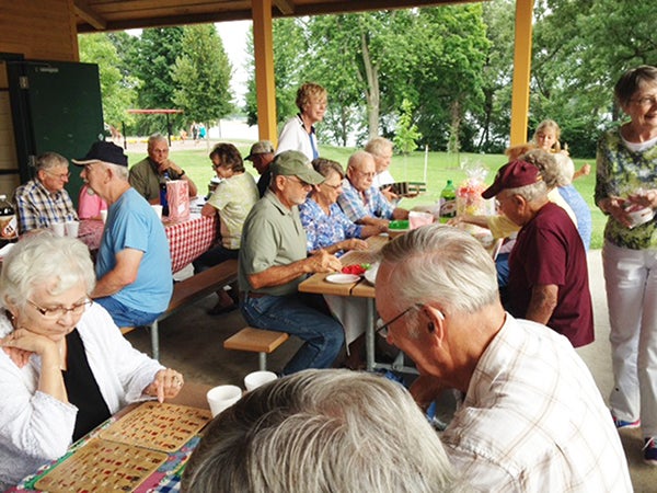 Over 40 Meals on the Go volunteer drivers met at Pioneer Park on July 8 for a picnic and a dirty game of Bingo. Many local businesses donated prizes to the event. -Provided