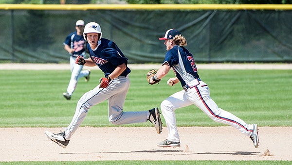 E.J. Thomas of Albert Lea Legion Post 56 tracks down a Rochester Patriots baserunner Thursday during the District 1 championship bracket semifinals at Dale Massey Field in Rochester. — Micah Bader/Albert Lea Tribune