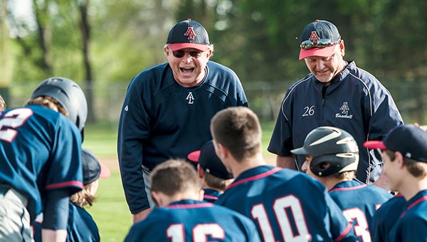 Albert Lea baseball coach Joe Sczublewski talks with his team after Chris Enderson hit a walk-off home run on May 7 to edge Mankato East 8-7 in Game 1 of a doubleheader at Hayek Field. — Micah Bader/Albert Lea Tribune