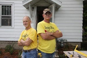 Two volunteers stop to pose for a picture while volunteering during Shinefest. - Provided
