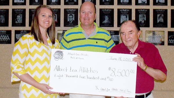 The Albert Lea Athletic Hall of Fame committee donated $8,500 on June 18 to the Albert Lea High School Activities Department. From left are Albert Lea Athletic Director Afton Wacholz, Tom Jones and Keith Fligge. The money will be used to offset the costs of student athletic registration fees for the 2015-2016 school year. The committee announced plans for the next banquet, which will be in July of 2016 with the date to be determined. The Albert Lea Athletic Hall of Fame committee is looking for a few new members to join in the planning for future events. Contact Jones at 507-377-9138 if interested. — Provided