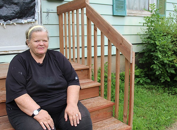 Top: Albert Lea resident Sandra Thompson is one of more than a handful whose home is being fixed up this week as part of Rocking the Block, a volunteer effort that incorporated more than 200 volunteers in 2014. - Sarah Stultz/Albert Lea Tribune
