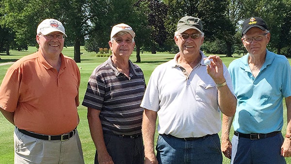 Paul Yost hit his first career hole-in-1 on the 150-yard fourteenth hole with a 6-iron at Rice Lake Golf & Country Club. From left are Dave Olson, Kent Jasperson, Yost and Paul Larson. Olson, Jasperson and Larson are Yost’s playing partners and witnesses for his hole-in-1. — Provided