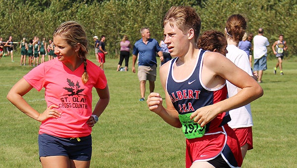 Nikk Christianson of Albert Lea competes Friday during a cross country meet at St. Olaf College in Northfield. — Kathie Lein/For the Albert Lea Tribune