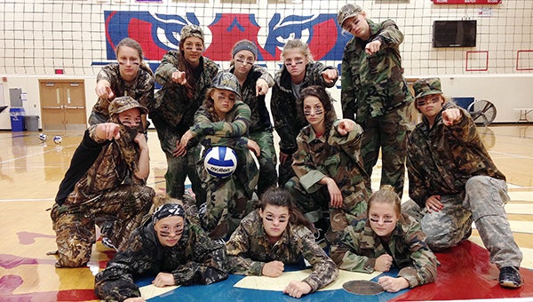 The Albert Lea volleyball team wears camouflage on the court at Albert Lea High School to show support to those who are serving and have served in the United States’ military. Current and former members of the military will receive free admission and be honored during intermission at the Tigers’ home opener at 7 p.m. Thursday. — Provided