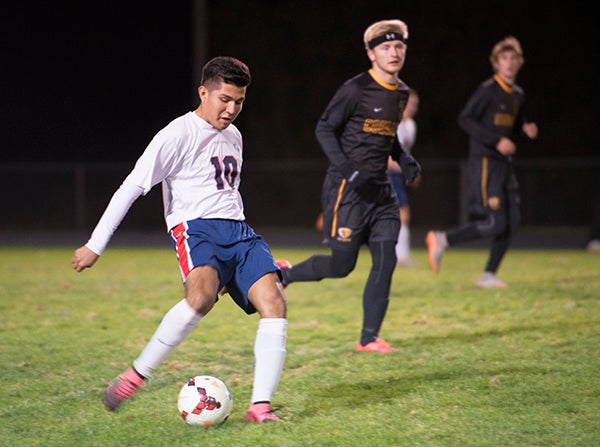 Albert Lea's Alejandro Garcia dribbles the ball during Wednesday's Section 2A semifinals against Mankato East at Jim Gustafson Field. - Colleen Harrison/Albert Lea Tribune