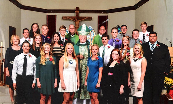 St. Theodore Catholic Church celebrated the Sacrament of Confirmation at the 5:15 p.m. Mass Sept. 19. Bishop Bernard Harrington presided. Pictured front row from left are Tanner Bellrichard, Samantha Nielsen, Katie Schiltz, Katie Rasmussen, Elizabeth Holcomb and Haley Simon. Second row from left are Janet Eisenbraun, faith formation director and youth minister, Hannah Savelkoul, Francesca Eckstrom, Bishop Bernard Harrington, Lucas Hacker, Bailey Sandon and Ryan Chirpich. Third row from left are Sam Ellis, Lindsey Horejsi, Foster Otten, Jake Thompson, the Rev. Russ Scepaniak, Deacon Mike Ellis, Andy Woitas, Aaron Fitzlaff, Joshua Majerus and Tanner Alfson. - Photo courtesy Peoble Photography