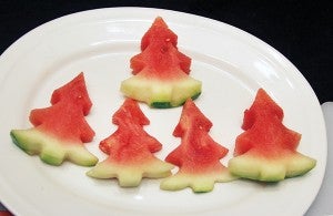 Fancy up some watermelon this season by using a cookie cutter to cut out a Christmas tree design.
