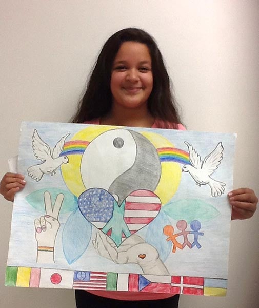 Abby Romo, a sixth-grade student at Southwest Middle School, has taken the first step to becoming an internationally recognized artist by winning a local competition sponsored by the Lakeview Lions Club. Her poster was among more than 400,000 entries submitted worldwide in the 28th Lions International Peace Poster Contest. Romo was awarded first place and $50 at the Veterans Day program at Southwest. The poster was selected for its originality, artistic merit and portrayal of the contest theme, “Share Peace.” Romo’s poster will advance to the next stage of the judging process which will take place in February in Mankato. - Provided
