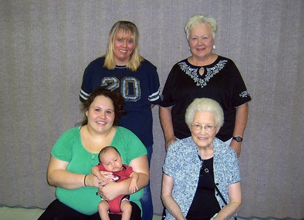 Grandmother Diana Engen, top left; great-grandmother Katie Radke, top right; mother Kayle Lee and great-great-grandmother Selma Lent pose with baby Adrian for a five generations photo. -Provided
