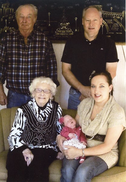 reat-grandfather Gene Thompson, grandfather Mike Thompson, great-great-grandmother Marian Thompson and mother Megan Rauenhorst gathered for a five generations photo with baby Makenzie Rose Rauenhorst. -Provided