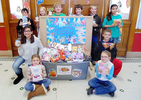 The students at St. Casimir’s Catholic school recently collected food and nonperishable items for the Wells Area Food Shelf. On Nov. 24 the students took a walking field trip to deliver the items to Good Shepherd Lutheran Church, where the food shelf is located. Provided