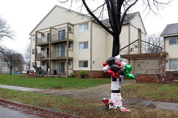 A makeshift memorial stands outside 1611 Plymouth Ave. N. where Jamar Clark was shot by police on Nov. 15. - Tim Nelson/MPR News