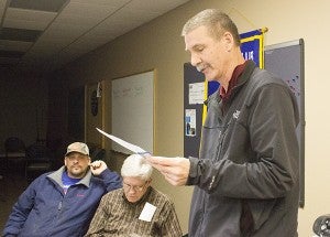 Noon Kiwanis member Dennis Dieser presents the Distinguished Club Award to the Aktion Club Wednesday night at The Arc of Freeborn County. - Sam Wilmes/Albert Lea Tribune