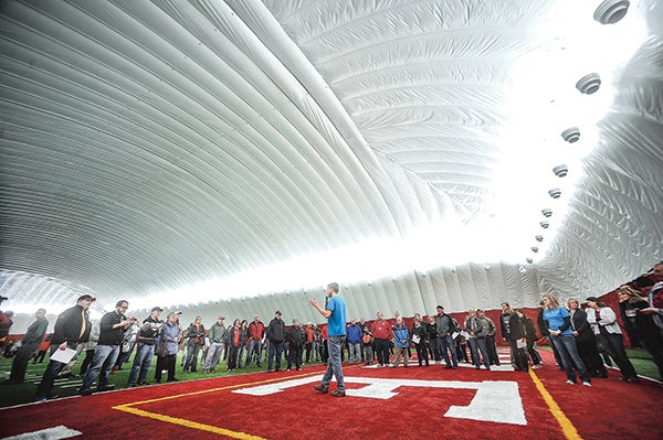Greg Siems, executive director of Vision 2020, welcomes everybody to the dome over Art Hass Stadium during the open house Saturday morning. - Eric Johnson/Albert Lea Tribune