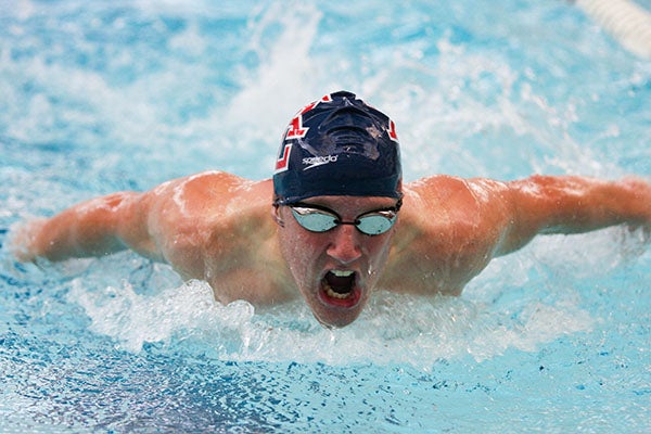 Albert Lea’s Aaron Zogg swims the butterfly in the 200-meter individual medley Tuesday during a swim meet against Faribault. Albert Lea won 93-85, ending a 10-year drought for the boys’ swimming team. - Laura Mae/For the Albert Lea Tribune 