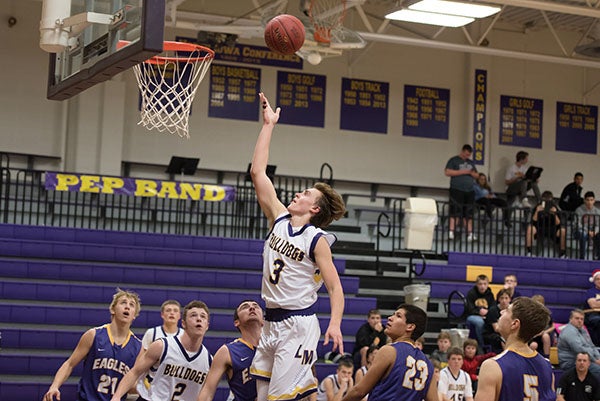 Lake Mills’ Granger Kingland puts up a shot during Tuesday’s 86-40 win over Eagle Grove. -Lory Groe/For the Albert lea tRIBUNE