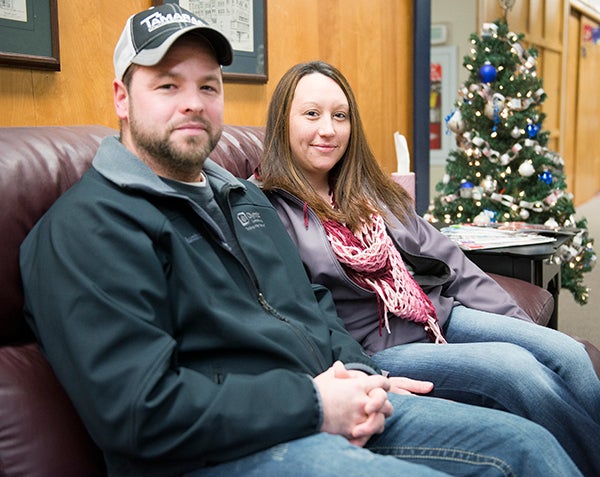 Matt Humphrey and his girlfriend, Jessica Armstrong, found $300 in cash in the Albert Lea Walmart parking lot on Dec. 9. The couple turned in the money to the customer service desk. - Colleen Harrison/Albert Lea Tribune