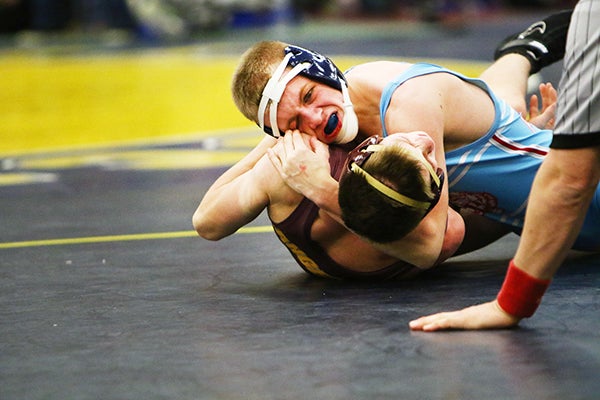 Albert Lea’s Gavin Ignaszewski wrestles Friday in the first day of the Minnesota Christmas Tournament at Rochester Technical and Community College. - Pam Nelson/For the Albert Lea Tribune