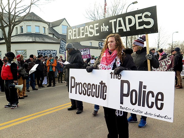 Protesters march from the 4th Precinct in north Minneapolis to the city’s downtown Saturday. -Peter Cox/MPR News