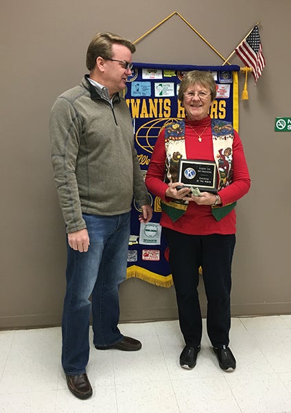 Albert Lea Daybreakers Kiwanis Club President Matt Greibrok presents member, Julie Ehlers, with the Kiwanian of the Month Award for her many hours of service in bell ringing for the Salvation Army duing the holiday season.  Daybreakers Kiwanis welcomes new members and invites community members to come and learn more about their club at 7 a.m. on Fridays in the meeting room at MarketPlace Foods in Albert Lea. - Provided