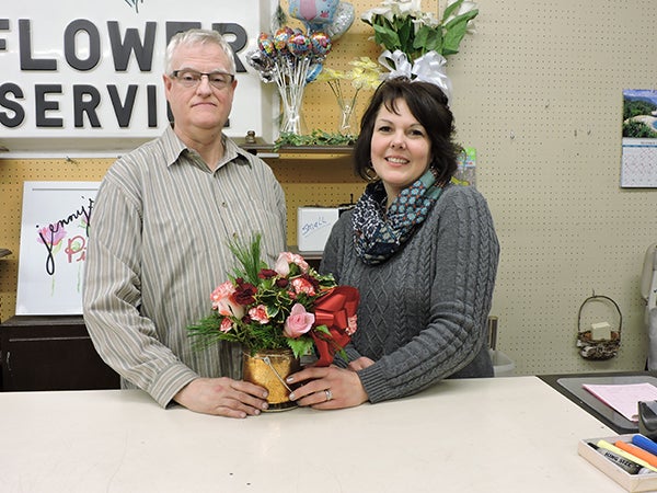 Dick Meyer of Dick’s Flower Service will work for Jenny Lutteke as she hopes to find the same success under the name of Jenny’s Pink Petals Flower Shop.  - Kelly Wassenberg/Albert Lea Tribune 