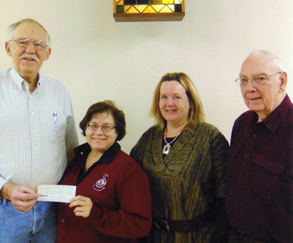 Jake Loper, chaplain of Western Star Lodge No. 26 A.M. and F.M. of Albert Lea, along with Treasurer Bill Webster present the group’s annual monetary gift to Maj. Louise Delano-Sharpe and Marilyn Lancaster of The Salvation Army in Albert Lea. The donation will support the work they do with The Salvation Army’s food shelf. -Provided