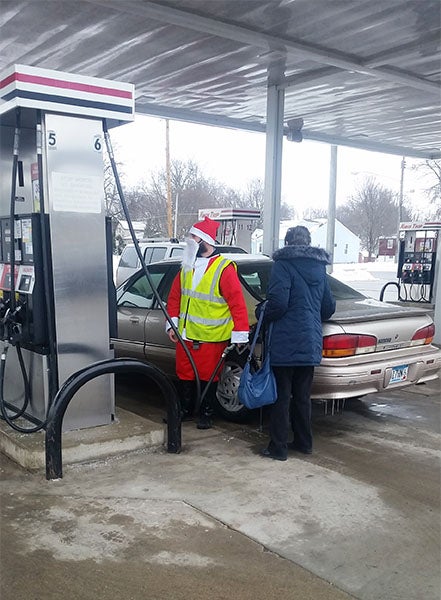 Kwik Trip Store 804 is part of the “Do Something” zone. As a part of its zone competitions, the store met the challenge of selling 500 pizzas for the company pizza sale. Assistant Store Leader Ray Besco also took part in a pre-Christmas do-good activity of pumping gas for customers while dressed in a Santa suit. — Provided